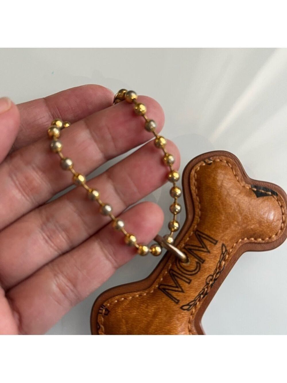 MCM COGNAC DOG BONE BAG CHARM - Picture 3 of 4